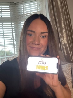 Winner Laura W. background