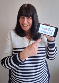 Winner Karen Reoch background